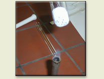 Heating of the mixture in a test tube